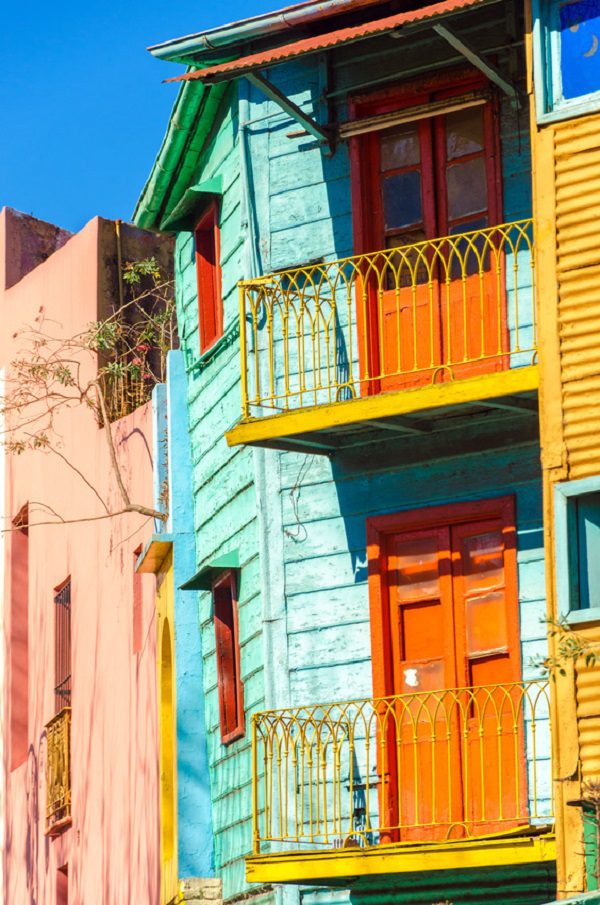 Brightly colored balconies on a dilapidated building in La Boca neighborhood of Buenos Aires